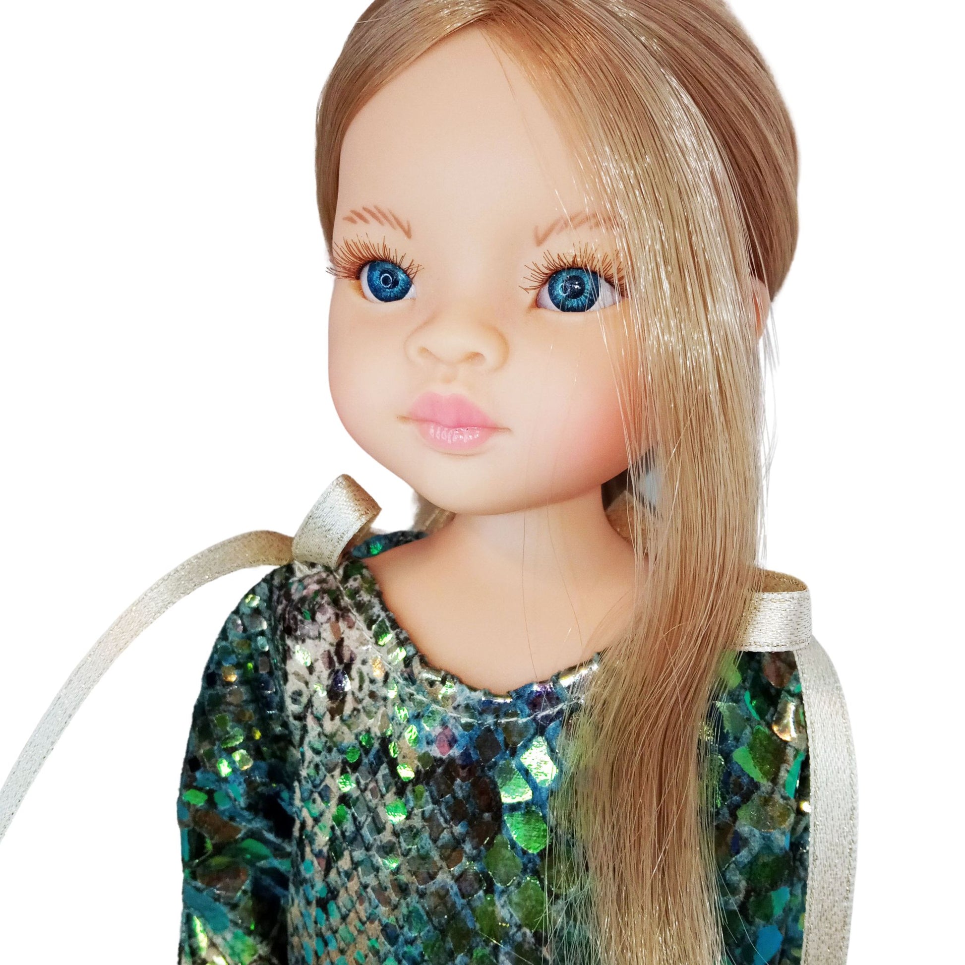 A shimmering green and gold sequined dress for a 12-inch/32 cm Paola Reina doll, featuring gold ribbon ties and a luxurious party-ready design.