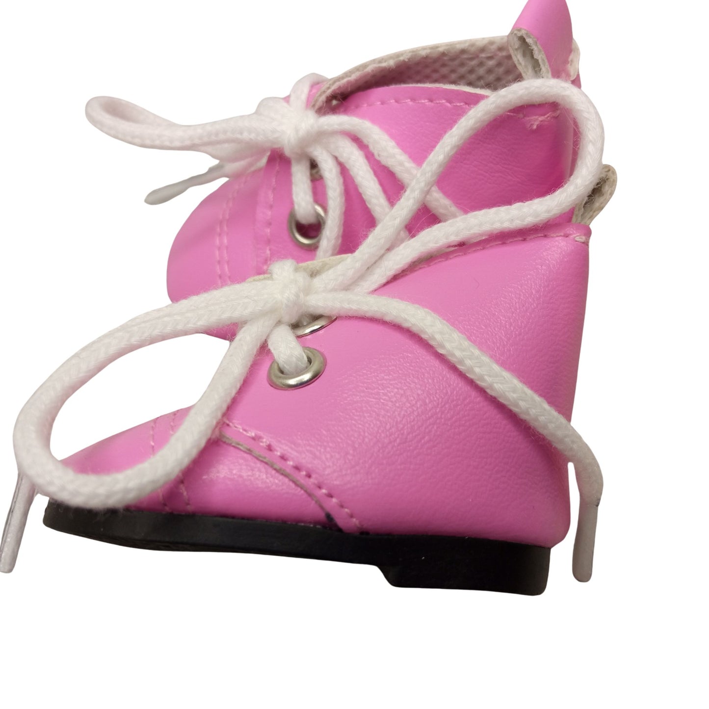 Bright pink lace-up boots for 32 cm Paola Reina dolls with white laces and black soles, perfect for playful adventures and stylish fun.
