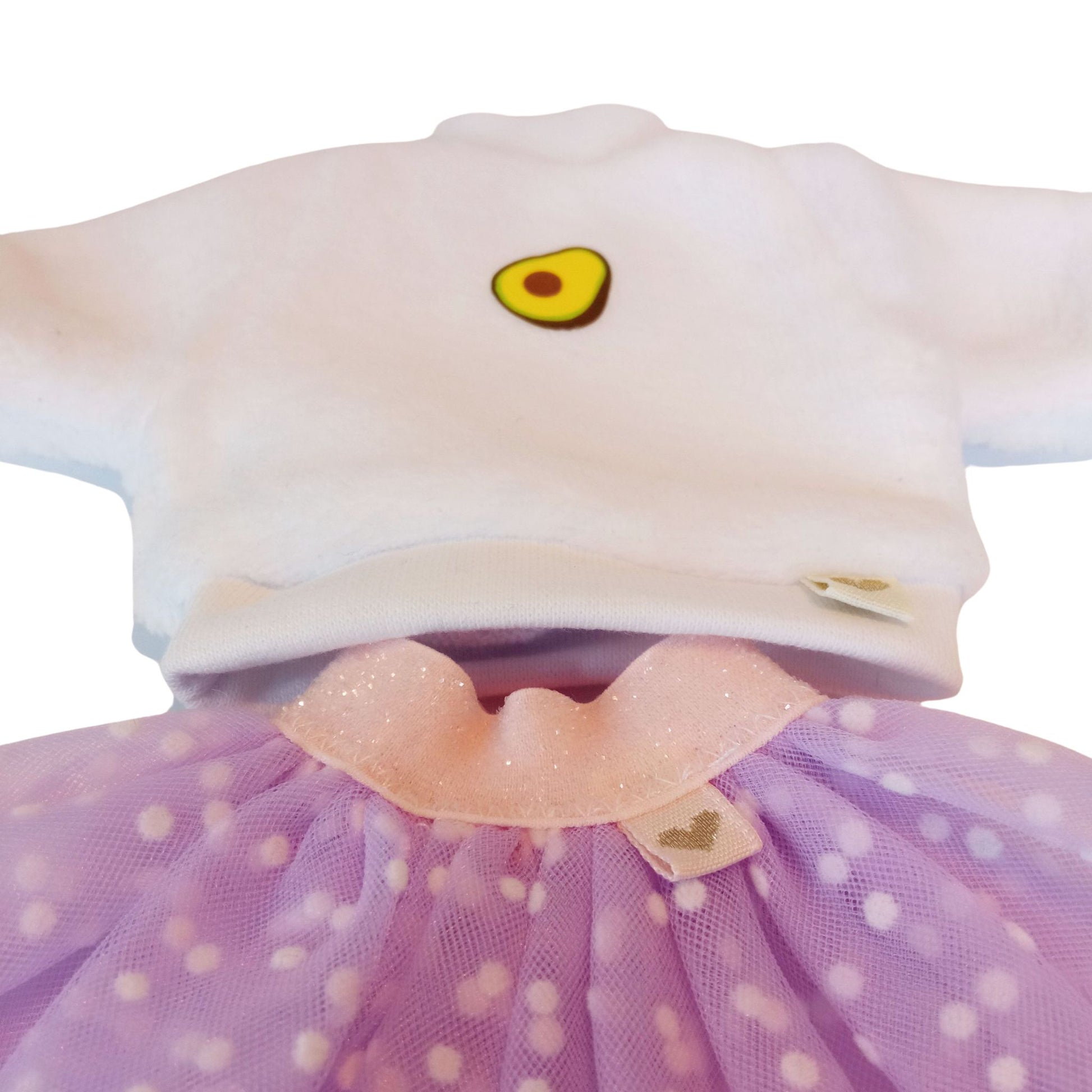 Stylish Paola Reina dolls dressed in white plush sweatshirts with cute embroidery and fluffy polka-dot mesh skirts.